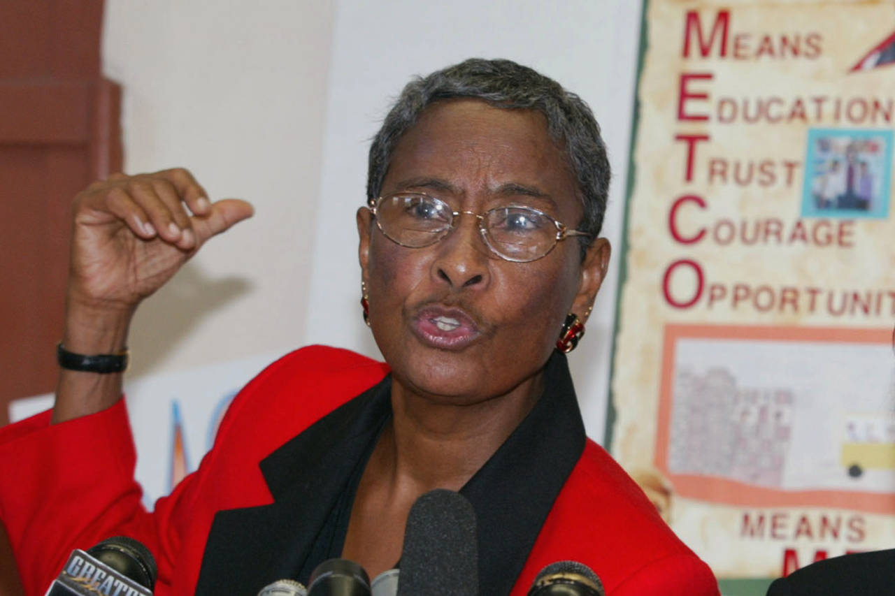 FILE - Jean McGuire, then-executive director of METCO, speak at a news conference on Oct. 7, 2003, ...