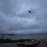 
              National Disaster Response Force boats are anchored as rain clouds hover over the river Brahmaputra in Guwahati, northeastern Assam state, India, Tuesday, Oct. 25, 2022. (AP Photo/Anupam Nath)
            