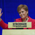 
              Scotland's First Minister Nicola Sturgeon delivers her keynote speech during the SNP conference at The Event Complex Aberdeen (TECA) in Aberdeen, Scotland, Monday Oct. 10, 2022. (Andrew Milligan/PA via AP)
            