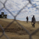 
              FILE - Soldiers patrol the border in Elias Pina, Dominican Republic, on the border with Belladere, Haiti, Friday, March 5, 2021. As Haiti’s crisis, exacerbated by the 2021 assassination of ex-Haitian President Jovenel Moïse, has only deepened and spurred on a massive flight of migrants, the Dominican Republic has gradually grown more hardline with its migratory and border policies. (AP Photo/Dieu Nalio Chery, File)
            