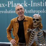 
              Swedish scientist Svante Paabo stands by a replica of a Neanderthal skeleton at the Max Planck Institute for Evolutionary Anthropology in Leipzig, Germany, Monday, Oct. 3, 2022. Swedish scientist Svante Paabo was awarded the 2022 Nobel Prize in Physiology or Medicine for his discoveries on human evolution. (Hendrik Schmidt/dpa via AP)
            