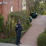 
              A police officer stands outside the home of House Speaker Nancy Pelosi and her husband Paul Pelosi in San Francisco, Friday, Oct. 28, 2022. Paul Pelosi, was attacked and severely beaten by an assailant with a hammer who broke into their San Francisco home early Friday, according to people familiar with the investigation. (AP Photo/Godofredo A. Vásquez)
            