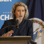 
              Virginia State Sen. Jen Kiggans, R-Virginia Beach, gestures during a debate with US Rep. Elaine Lauria, D-2nd. sponsored by the Hampton roads Chamber of Congress Wednesday, Oct. 12, 2022, in Virginia Beach. Va. (AP Photo/Steve Helber)
            