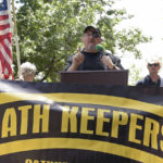 
              FILE - Stewart Rhodes, founder of the Oath Keepers, center, speaks during a rally outside the White House in Washington, June 25, 2017.  Federal prosecutors are preparing to lay out their case against the founder of the Oath Keepers’ extremist group and four associates. They are charged in the most serious case to reach trial yet in the Jan. 6, 2021, U.S. Capitol attack. Opening statements are expected Monday in Washington’s federal court in the trial of Stewart Rhodes and others charged with seditious conspiracy. (AP Photo/Susan Walsh, File)
            
