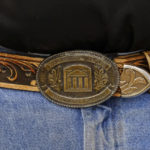 
              Pastor Bart Barber, president of the Southern Baptist Convention, wears a Southwestern Baptist Theological Seminary belt buckle at a livestock event hosted by local chapters of the 4-H Club and National FFA Organization in McKinney, Texas, on Saturday, Sept. 24, 2022. (AP Photo/Audrey Jackson)
            