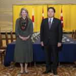 
              Canadian Foreign Minister Melanie Joly and Japanese Foreign Minister Yoshimasa Hayashi pose for media prior to their meeting at the Iikura Guest House in Tokyo, Tuesday, Oct. 11, 2022. (Yuichi Yamazaki/Pool Photo via AP)
            