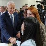 
              President Joe Biden greets people after speaking during a visit to the Democratic National Committee Headquarters, Monday, Oct. 24, 2022, in Washington. (AP Photo/Evan Vucci)
            