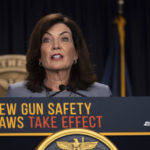 
              FILE - New York Gov. Kathy Hochul speaks during a news conference about upcoming "Gun Free Zone" implementation at Times Square, Aug. 31, 2022, in New York. Hochul in recent days announced the endorsement of several law enforcement unions and released her own ad with a public safety message titled, “Focused on it,” to remind voters that she toughened the state’s gun laws. (AP Photo/Yuki Iwamura, File)
            