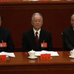 
              From left, Zhang Dejiang, former Premier Wen Jiabao, and Wang Qishan attend the closing ceremony of the 20th National Congress of China's ruling Communist Party at the Great Hall of the People in Beijing, Saturday, Oct. 22, 2022. (AP Photo/Ng Han Guan)
            
