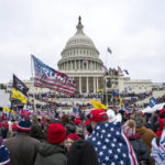 
              FILE - Rioters loyal to President Donald Trump rally at the U.S. Capitol in Washington on Jan. 6, 2021. . (AP Photo/Jose Luis Magana, File)
            