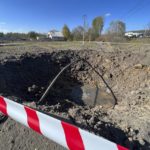 
              This handout photo released by Vyacheslav Gladkov, governor of the Belgorod region, claims to show a crater created by an explosion after alleged Ukrainian military shelling, outside Belgorod, Russia, Sunday, Oct. 16, 2022. Russian officials said their air defenses in the southern Belgorod region bordering Ukraine shot down "a minimum" of 16 Ukrainian missiles, Ria Novosti reported. (Vyacheslav Gladkov, governor of the Belgorod region in his telegram channel via AP)
            