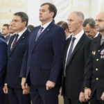 
              From left, Denis Pushilin, the leader of the Donetsk People's Republic and Leonid Pasechnik, leader of self-proclaimed Luhansk People's Republic, Moscow-appointed head of Kherson Region Vladimir Saldo, Moscow-appointed head of Zaporizhzhia region Yevgeny Balitsky, and Artem Vladimirovich Zhoga, commander of the Sparta Battalion of Donetsk People's Republic separatist force listen to Russian national anthem during a ceremony in the Kremlin to sign the treaties for four regions of Ukraine to join Russia in the Kremlin in Moscow, Russia, Friday, Sept. 30, 2022. The signing of the treaties making the four regions part of Russia follows the completion of the Kremlin-orchestrated "referendums." (Mikhail Metzel, Sputnik, Government Pool Photo via AP)
            