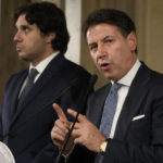 
              5-Star Movement leader Giuseppe Conte talks to the press at the Quirinale Presidential Palace after a meeting with Italian President Sergio Mattarella as part of a round of consultations with party leaders to try and form a new government, in Rome, Thursday, Oct. 20, 2022. At left 5-Star Movement's Francesco Silvestri. (AP Photo/Gregorio Borgia)
            