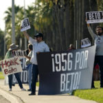 
              Supporters of Texas Democratic gubernatorial candidate Beto O'Rourke cheer outside the site of his debate with Texas Gov. Greg Abbott, Friday, Sept. 30, 2022, in Edinburg, Texas. As Democrats embark on another October blitz in pursuit of flipping America's biggest red state, Republicans are taking a swing of their own: Making a play for the mostly Hispanic southern border on Nov. 8 after years of writing off the region that is overwhelmingly controlled by Democrats. (AP Photo/Eric Gay)
            