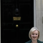 
              Outgoing British Prime Minister Liz Truss delivers a speech outside Downing Street in London, Tuesday, Oct. 25, 2022. Former Treasury chief Rishi Sunak is set to become Britain's first prime minister of color after being chosen Monday to lead a governing Conservative Party desperate for a safe pair of hands to guide the country through economic and political turbulence. (AP Photo/Alastair Grant)
            