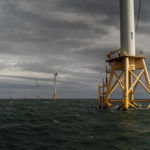 
              FILE- The five turbines of America's first offshore wind farm, owned by the Danish company, Orsted, stand off the coast of Block Island, R.I., in this, Oct. 17, 2022, file photo. The federal government is working on a plan to protect right whales while also developing offshore wind power off the the East Coast. (AP Photo/David Goldman)
            