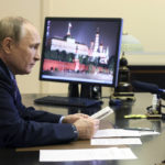 
              Russian President Vladimir Putin attends a meeting on economic issues via videoconference at the Novo-Ogaryovo residence outside Moscow, Russia, Thursday, Oct. 6, 2022. (Gavriil Grigorov, Sputnik, Kremlin Pool Photo via AP)
            