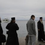 
              Orthodox monks and priests wait for the boat in the Mount Athos, northern Greece, on Friday, Oct. 14, 2022. The monastic community was first granted self-governance through a decree by Byzantine Emperor Basil II, in 883 AD. Throughout its history, women have been forbidden from entering, a ban that still stands. This rule is called "avaton" and the researchers believe that it concerns every form of disturbance that could affect Mt. Athos. (AP Photo/Thanassis Stavrakis)
            