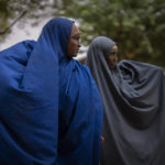 
              Two women walk near the Ethiopian border crossing on the outskirts of Dollow, Somalia, on Tuesday, Sept. 20, 2022.  Somalia is in the midst of the worst drought anyone there can remember. A rare famine declaration could be made within weeks. Climate change and fallout from the war in Ukraine are in part to blame. (AP Photo/Jerome Delay)
            