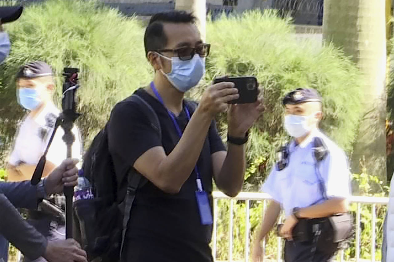 In this photo taken from video, Garry Pang Moon-yuen is seen outside the West Kowloon Court on Nov....