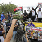 
              FILE - Attorney Benjamin Crump talks to a crowd of supporters during a "Justice for Pamela Turner" rally on the two-year anniversary of Turner's death, May 13, 2021, in Baytown, Texas. Turner was fatally shot in 2019 by a police officer in the Houston suburb after a struggle over his stun gun. On Tuesday, Oct. 11, 2022, Juan Delacruz, a Texas police officer, was acquitted of an assault charge related to the 2019 fatal shooting of. (Godofredo A. Vásquez/Houston Chronicle via AP, File)
            