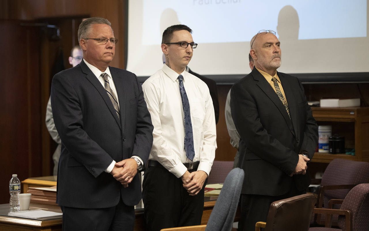 Paul Bellar, middle, appears before Jackson County Circuit Court Judge Thomas Wilson on Wednesday, ...