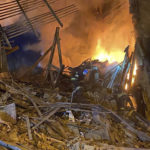 
              In this photo provided by the Ukrainian Emergency Service, rescuers work at the scene of a building damaged by shelling in Zaporizhzhia, Ukraine, Thursday, Oct. 6, 2022. (Ukrainian Emergency Service via AP )
            