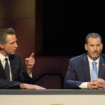 
              Gubernatorial candidates Democratic Gov. Gavin Newsom, left, and Republican challenger state Sen. Brian Dahle spar during their debate held by KQED Public Television in San Francisco, on Sunday, Oct. 23, 2022. (AP Photo/Rich Pedroncelli, Pool)
            