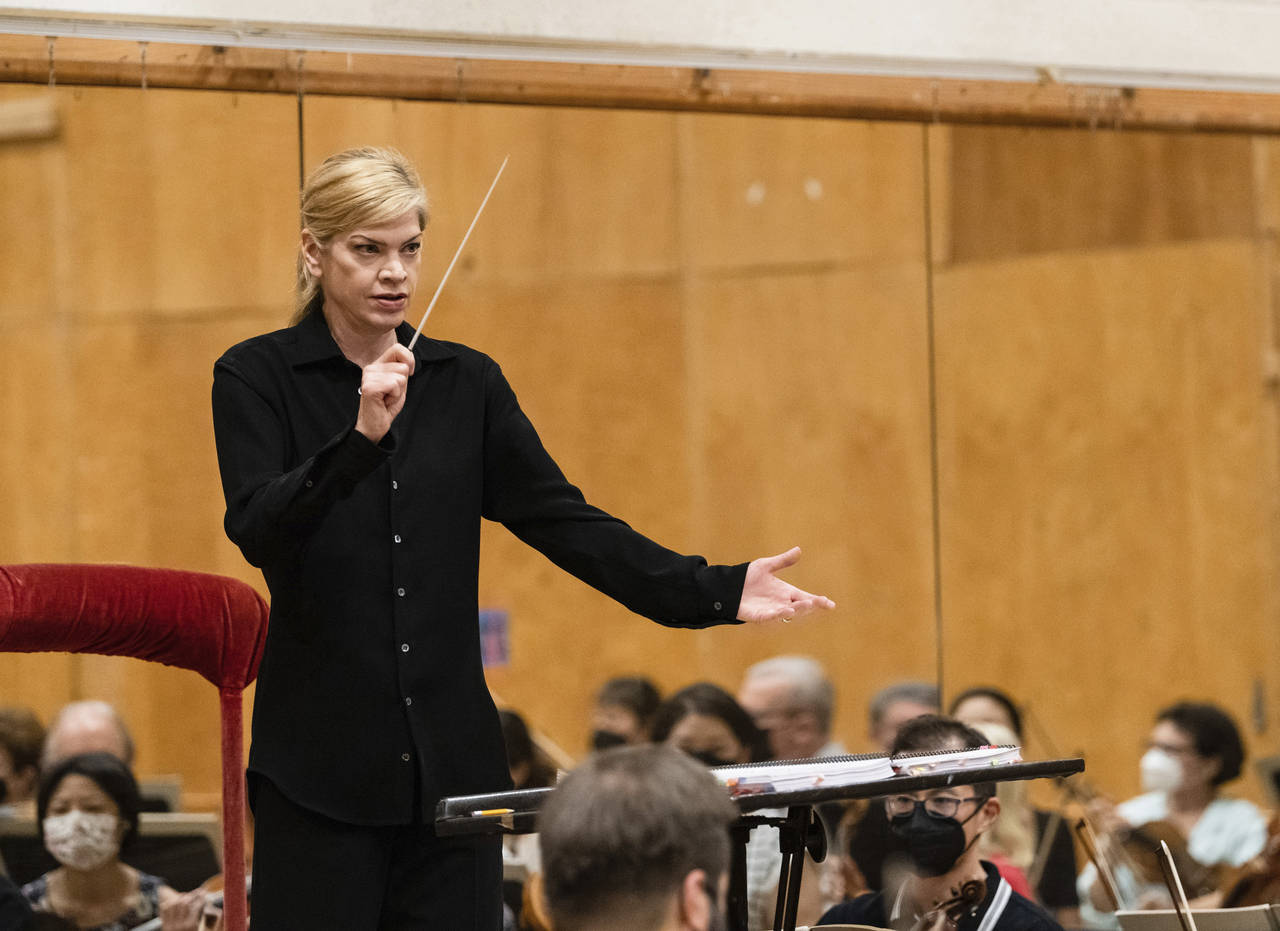 This image released by the Metropolitan Opera shows Keri-Lynn Wilson conducting a rehearsal for Sho...