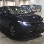 
              A man enters the Luxgen n7 electric car during the 2022 Hon Hai Tech Day (HHTD 22) at the Nangang Exhibition Center in Taipei, Taiwan, Tuesday, Oct. 18, 2022. Foxconn Technology Group said the Luxgen n7 will be sold by Yulon Motor as the starting next year and should be able to travel 700 kilometers (440 miles) on one charge. (AP Photo/Chiang Ying-ying)
            