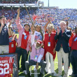 
              James Meredith, who in 1962 became the first Black student to enroll at the University of Mississippi, is honored during the first half of an NCAA college football game between Mississippi and Kentucky in Oxford, Miss., Saturday, Oct. 1, 2022. The university is holding several events this academic year to mark 60 years of integration and to honor Meredith's legacy. (AP Photo/Thomas Graning)
            