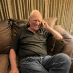 
              John F. Clauser speaks to reporters on the phone at his home in Walnut Creek, Calif., on Tuesday, Oct. 4, 2022.  Three scientists jointly won this year's Nobel Prize in physics on Tuesday, for their work on quantum information science that has significant applications, for example in the field of encryption. Clauser, Alain Aspect of France, and Anton Zeilinger of Austria were cited by the Royal Swedish Academy of Sciences for discovering the way that particles known as photons can be linked, or “entangled,” with each other even when they are separated by large distances.(AP Photo/Terry Chea)
            