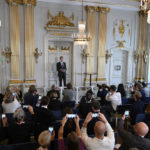 
              Permanent Secretary of the Swedish Academy Mats Malm, center, announces the 2022 Nobel Prize in Literature, in Borshuset, Stockholm, Sweden, Thursday, Oct. 6, 2022. The 2022 Nobel Prize in literature was awarded to French author Annie Ernaux, for “the courage and clinical acuity with which she uncovers the roots, estrangements and collective restraints of personal memory,” the Nobel committee said. (Henrik Montgomery/TT News Agency via AP)
            