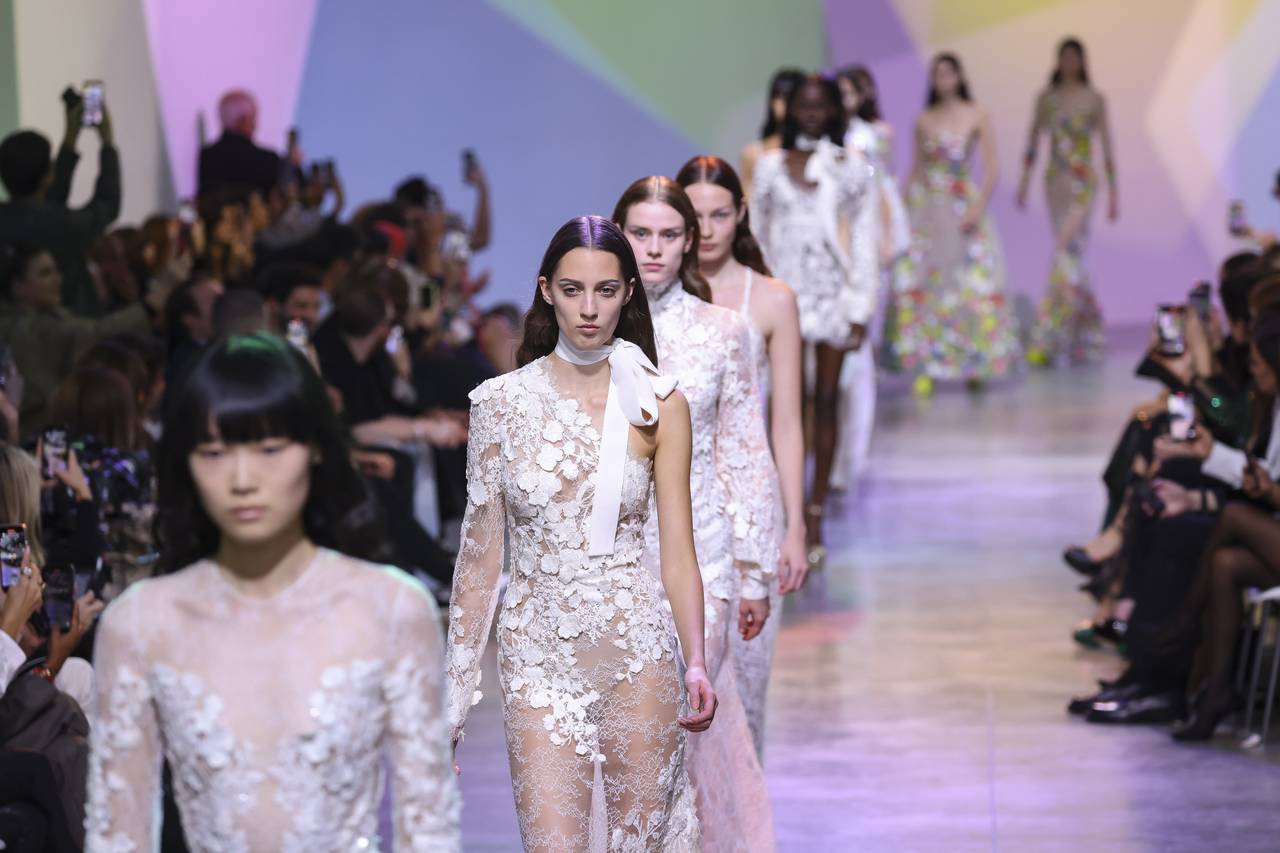 Models wear creations for the Elie Saab ready-to-wear Spring/Summer 2023 fashion collection present...