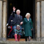 
              Britain's King Charles III and Camilla, the Queen Consort, leave Dunfermline Abbey, after a visit to mark its 950th anniversary, and after attending a meeting at the City Chambers in Dunfermline, Fife, where the King formally marked the conferral of city status on the former town. (Andrew Milligan/PA via AP)
            