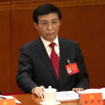 
              Politburo Standing Committee member Wang Huning attends the opening ceremony of the 20th National Congress of China's ruling Communist Party at the Great Hall of the People in Beijing, China, Sunday, Oct. 16, 2022. While Xi Jinping is primed to receive a third five-year term as head of China's ruling Communist Party at this week's congress, new members of the party's leading bodies are expected to be appointed at the meeting, whose proceedings are mainly held behind closed doors. (AP Photo/Mark Schiefelbein)
            