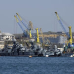 
              FILE - Russian Black Sea fleet ships are anchored in one of the bays of Sevastopol, Crimea, March 31, 2014. On Saturday, Oct. 29, 2022 at least two Russian ships suffered damage in a major port in Crimea, the Ukrainian peninsula annexed by Moscow in 2014. The Russian Defense Ministry said two ships received "minor damage" during an alleged Ukrainian drone attack on navy and civilian vessels docked in Sevastopol at 4:20 a.m. The ministry said 16 drones were used in the attack and that Russian forces had "repelled" them. (AP Photo, File)
            