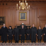 
              In this image provided by the Supreme Court, members of the Supreme Court pose for a photo during Associate Justice Ketanji Brown Jackson's formal investiture ceremony at the Supreme Court in Washington, Friday, Sept. 30, 2022. From left, Associate Justice Amy Coney Barrett, Associate Justice Neil Gorsuch, Associate Justice Sonia Sotomayor, Associate Justice Clarence Thomas, Chief Justice John Roberts, Associate Justice Ketanji Brown Jackson, Associate Justice Samuel Alito, Associate Justice Elena Kagan and Associate Justice Brett Kavanaugh. (Fred Schilling/U.S. Supreme Court via AP)
            