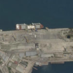 
              In this Planet Labs satellite image, the cargo ship Laodicea is docked at a port in Feodosia, Crimea, on July 11, 2022. Two weeks later, when it arrived at the Lebanese port city Tripoli, a manifest falsely claimed the barely and wheat flour in its hold was loaded at a small Russian port on the other side of the Black Sea. (Planet Labs via AP)
            