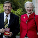 
              FILE - French physicist Professor Alain Aspect, left, holds the Niels Bohr Medal as he stands next to Queen Margrethe of Denmark, at the Carlsberg Honorary Residence in Copenhagen, Monday Oct. 7, 2013. On Tuesday, Oct. 4, 2022 the Nobel Prize in physics was awarded to three scientists, Alain Aspect, John F. Clauser and Anton Zeilinger for their work on quantum information science. (Finn Frandsen/Ritzau Scanpix via AP, File)
            
