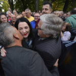 
              Protesters kiss opposition candidate Jelena Trivic during protest against alleged election fraud in a general elections in the Bosnian town of Banja Luka, 240 kms northwest of Sarajevo, Thursday, Oct. 6, 2022. Opposition parties asking to open the bags and recount the votes for the President of Republika Srpska. (AP Photo/Radivoje Pavicic)
            