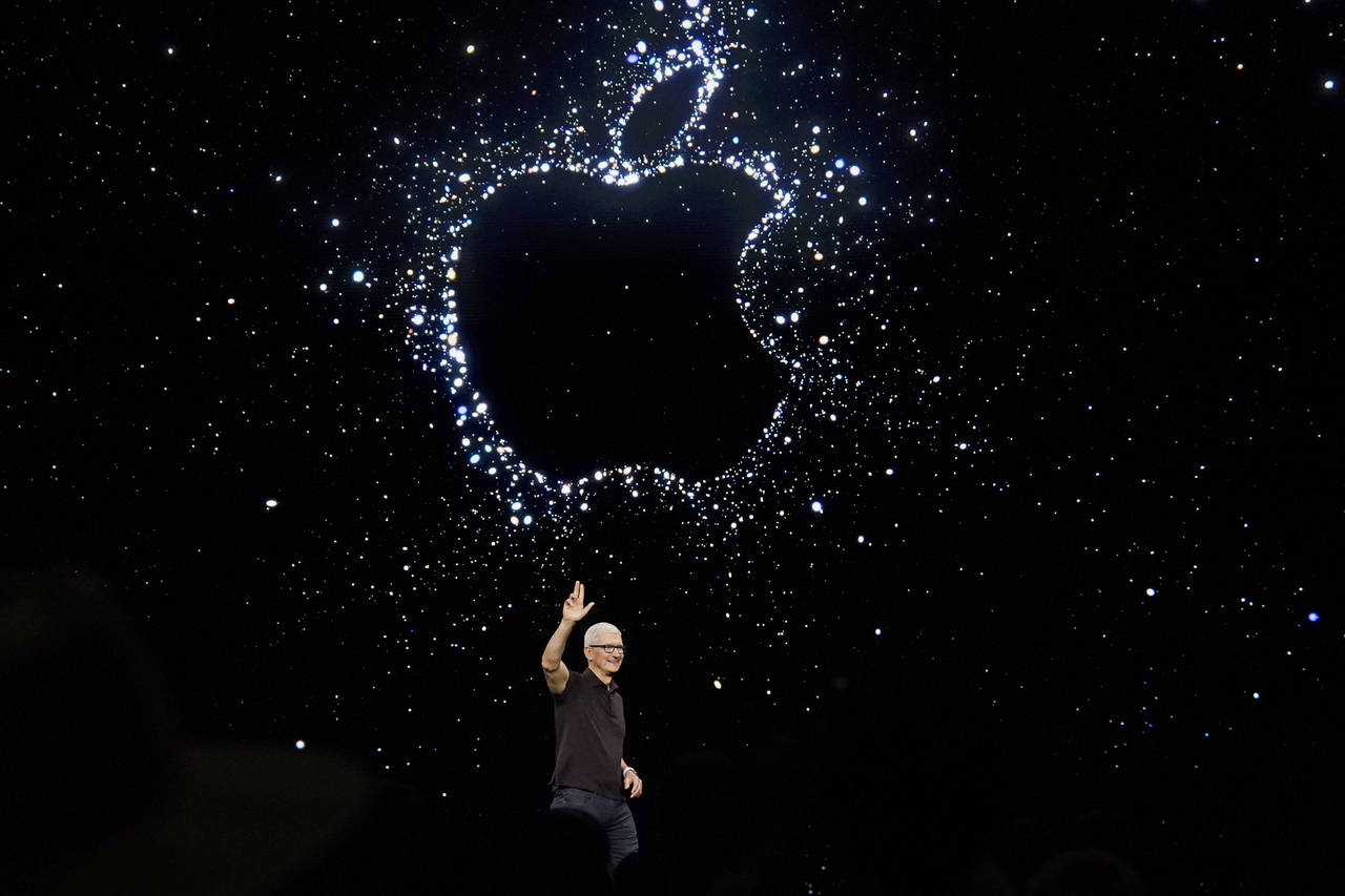 FILE - Apple CEO Tim Cook speaks at an Apple event on the campus of Apple's headquarters in Cuperti...