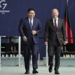 
              German Chancellor Olaf Scholz, right, and Mongolian Prime Minister Luvsannamsrai Oyun-Erdene, arrive for a joint press conference after a meeting at the chancellery in Berlin, Germany, Friday, Oct. 14, 2022. (AP Photo/Michael Sohn)
            