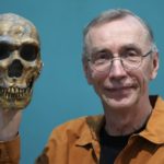 
              Swedish scientist Svante Paabo poses with a replica of a Neanderthal skeleton at the Max Planck Institute for Evolutionary Anthropology in Leipzig, Germany, Monday, Oct. 3, 2022. Swedish scientist Svante Paabo was awarded the 2022 Nobel Prize in Physiology or Medicine for his discoveries on human evolution. (AP Photo/Matthias Schrader)
            