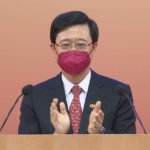 
              In this image made from video provided by Radio Television Hong Kong, Hong Kong Chief Executive John Lee makes a speech to mark China's National Day at the Convention Centre in Hong Kong, Saturday, Oct. 1, 2022. (Radio Television Hong Kong via AP Photo)
            