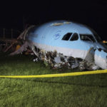 
              In this handout photo provided by the Civil Aviation Authority of the Philippines, a damaged portion of the Korean Air Lines Co. plane lies after it overshot the runway at the Mactan Cebu International Airport in Cebu, central Philippines, on Monday, Oct. 24, 2022. A Korean Air Lines Co. plane carrying 173 passengers and crew members overshot a runway while landing in bad weather in the central Philippines late Sunday and authorities said all those on board were safe. The airport is temporarily closed due to the stalled aircraft. (Civil Aviation Authority of the Philippines via AP)
            