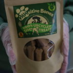 
              A package of Pawsitive Bones, a dog treat, produced by Food Shift, made of ingredients that are usually discarded, is shown Tuesday, Sept. 13, 2022 in Alameda, California.   "Best before” labels are coming under scrutiny as concerns about food waste grow around the world. Manufacturers have used the labels for decades to estimate peak freshness. But “best before” labels have nothing to do with safety, and some worry they encourage consumers to throw away food that’s perfectly fine to eat.  (AP Photo/Terry Chea)
            
