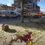 
              FILE - Blood on the ground at the scene of Russian shelling, in Kyiv, Ukraine, Monday, Oct. 10, 2022. Multiple explosions rocked Kyiv early Monday following months of relative calm in the Ukrainian capital. Kyiv Mayor Vitali Klitschko reported explosions in the city's Shevchenko district, a large area in the center of Kyiv that includes the historic old town as well as several government offices. (AP Photo/Efrem Lukatsky, File)
            