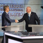 
              Minnesota Republican gubernatorial candidate Scott Jensen, left, and Democratic Gov. Tim Walz, shake hands before their debate at the studios of KTTC-TV in Rochester, Minn., on Tuesday night, Oct. 18. 2022. It was their only scheduled televised debate of the campaign. (Ben Mulholland/Pool Photo via AP)
            