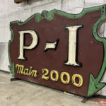 The P-I's first neon sign was installed at Sixth & Pine in 1927; it now is stored at MOHAI and is considered the first neon sign in Seattle. (Feliks Banel/KIRO Newsradio)